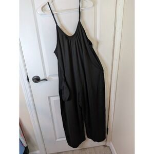 Black Wide Leg Relaxed Jumpsuit Adjustable Straps Pockets Sleeveless Romper